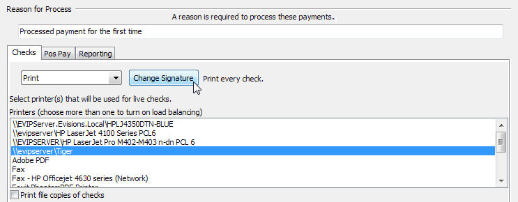 Change Signature button on the Checks tab of process pending.  It appears to the right of the Print /No Processing dropdown.